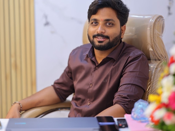 lead doctor of ub's goutham dental care sitting in doctors chair